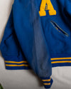A Blue and Yellow Varsity Jacket (M)